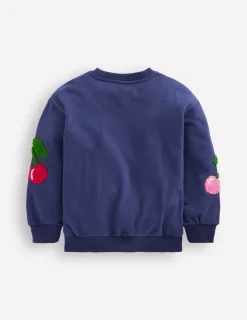 Hoodies & Kapuzenpullis | Oberteile & T-shirts | Boden Bouclé-Sweatshirt mit Grafik-Steuerbordblau Kirschen SteuerbordblauKirschen